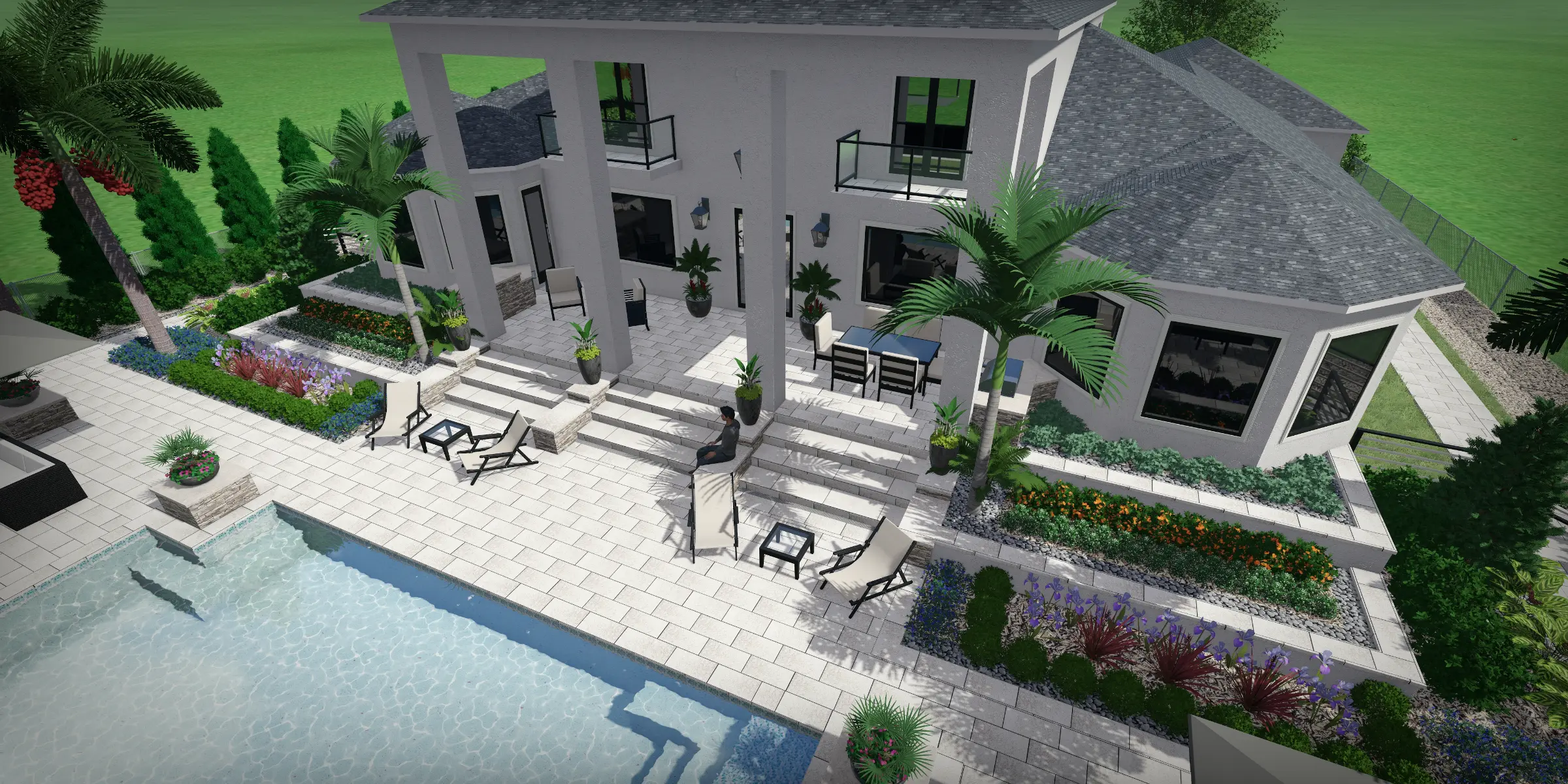 Contemporary white residential home with luxurious pool deck, lounge seating, and tropical landscaping in St Petersburg, FL