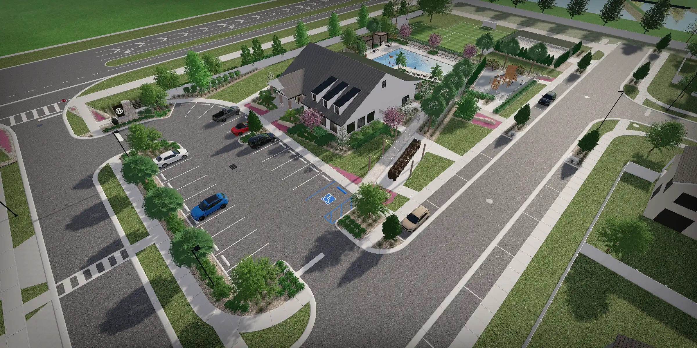 Aerial view of modern community facility with parking lot, swimming pool, and landscaped grounds in St Petersburg residential development