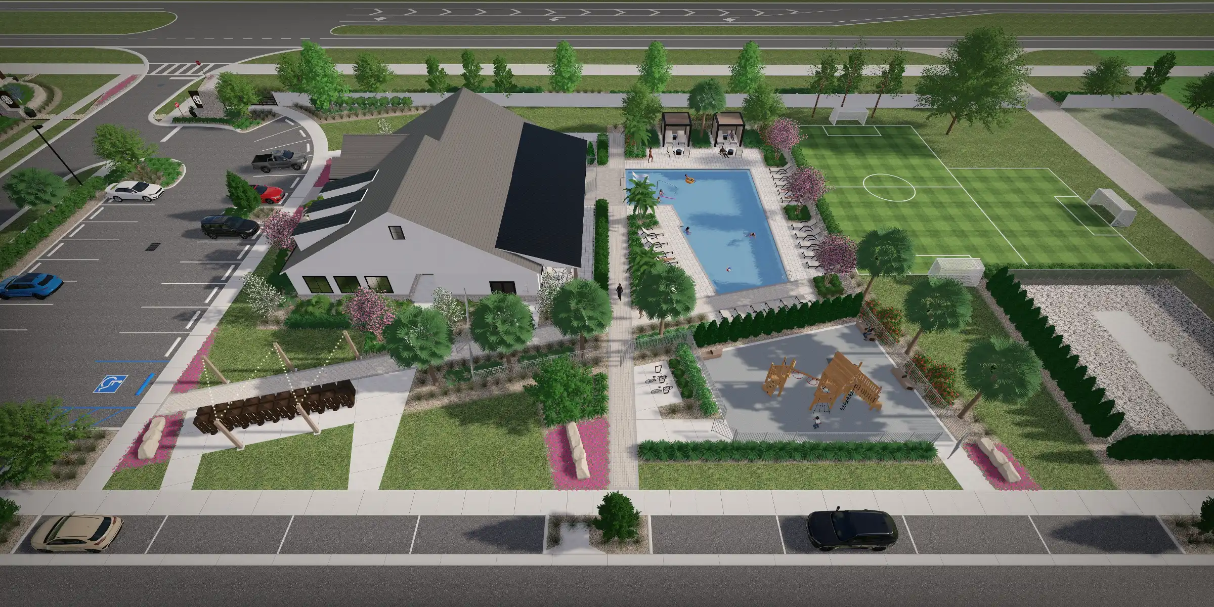 Aerial view of luxury residential community with modern clubhouse, Olympic-length pool, sports fields, and manicured landscape architecture in St Petersburg, FL.