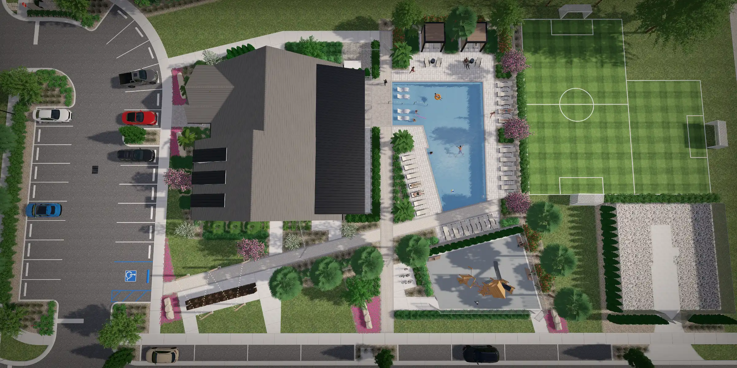 Aerial view of luxury residential community in St Petersburg FL featuring Olympic-sized pool, soccer fields, modern architecture, and manicured landscaping with sophisticated outdoor construction design.