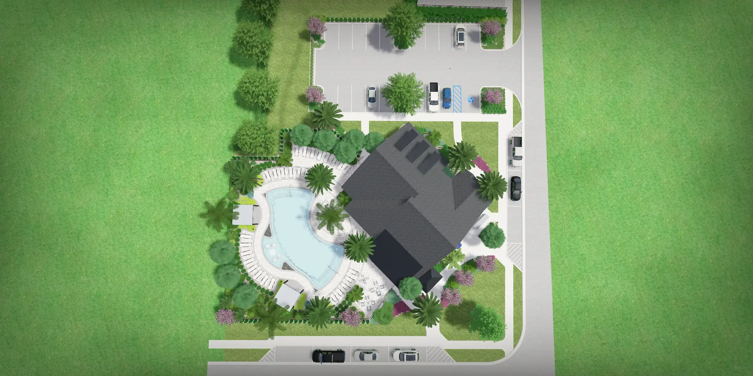 Aerial view of luxury residential community in St Petersburg FL featuring contemporary home with curved pool, tropical landscape design, and sophisticated outdoor living spaces.