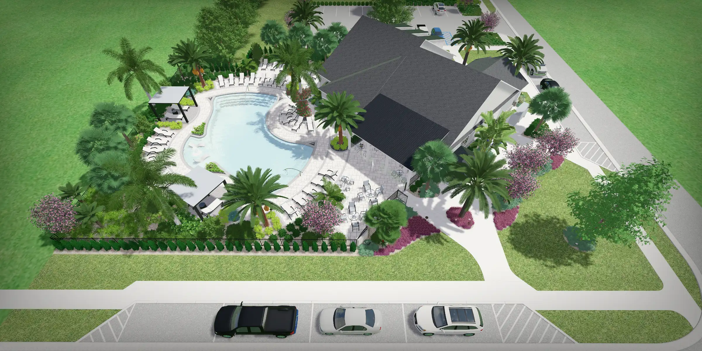 Aerial view of luxury residential home with curved pool, palm trees, and manicured landscape design in St Petersburg, FL community.