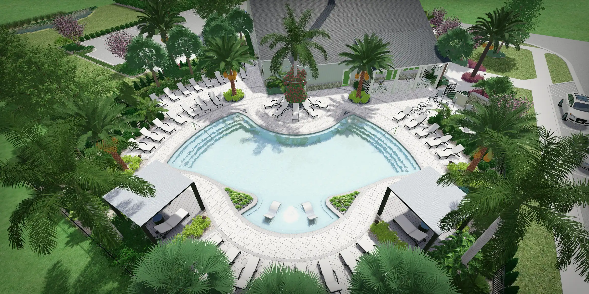 Aerial view of luxury pool with curved edges, lounge chairs, palm trees, and manicured landscape design in residential community