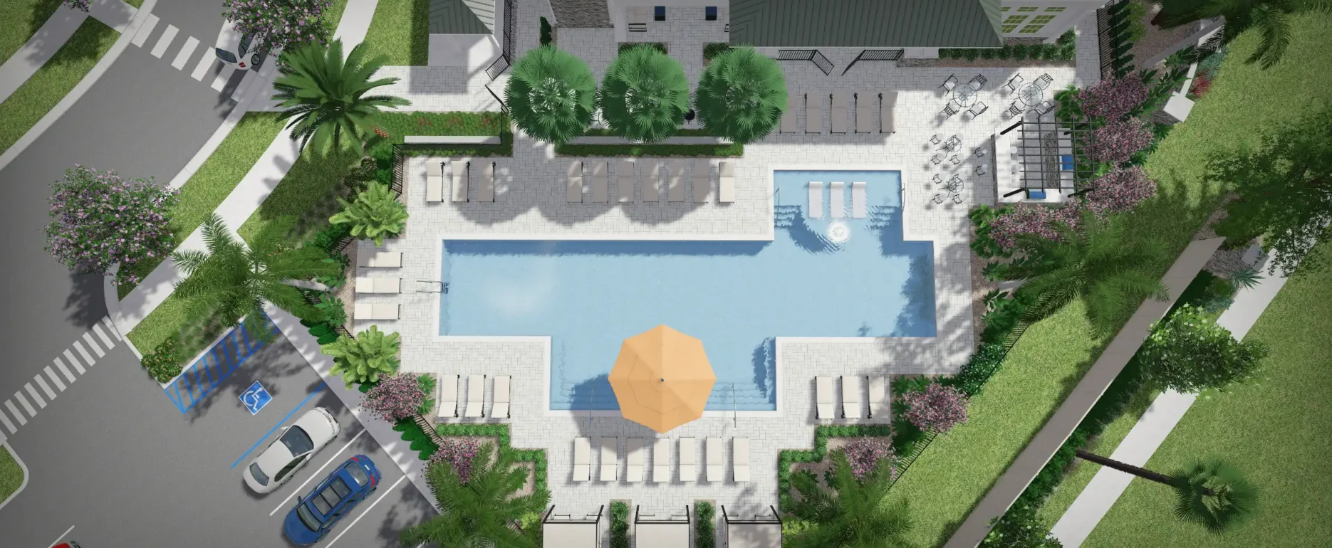 Luxury resort pool surrounded by lounge seating, palm trees, and manicured landscaping in St Petersburg FL residential community development.