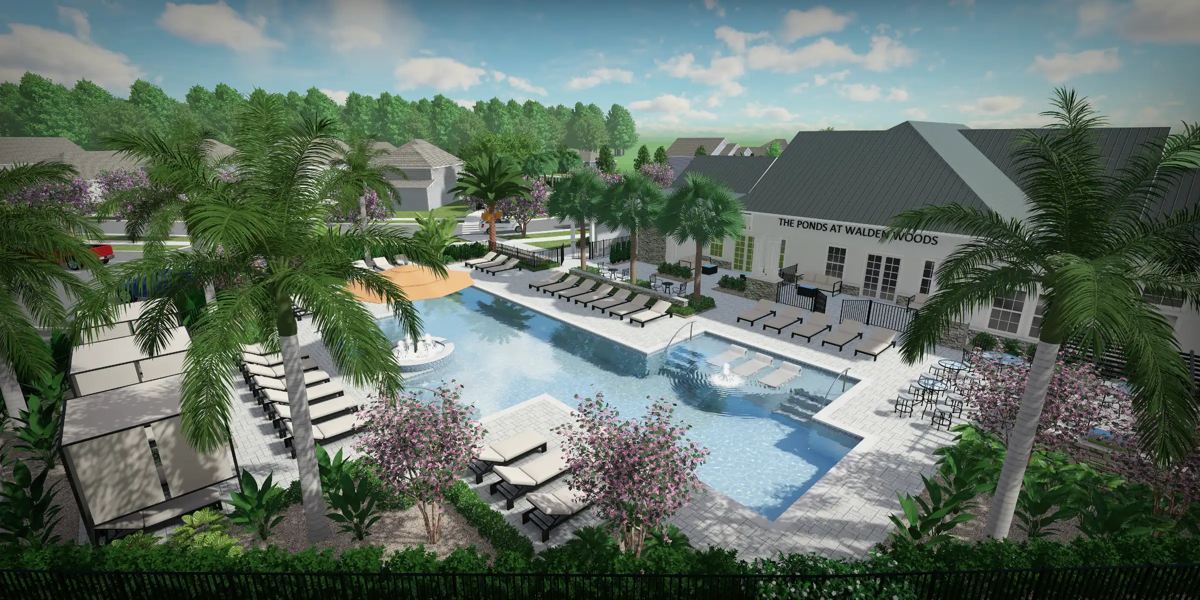 Resort-style pool deck with loungers, palm trees, and white clubhouse building featuring luxury outdoor construction and landscape design in St Petersburg residential community.